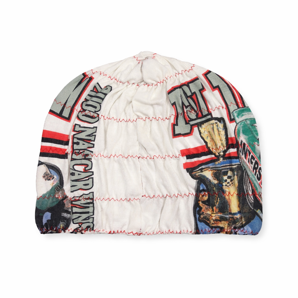 Patterned beanie with visible branding on a white background