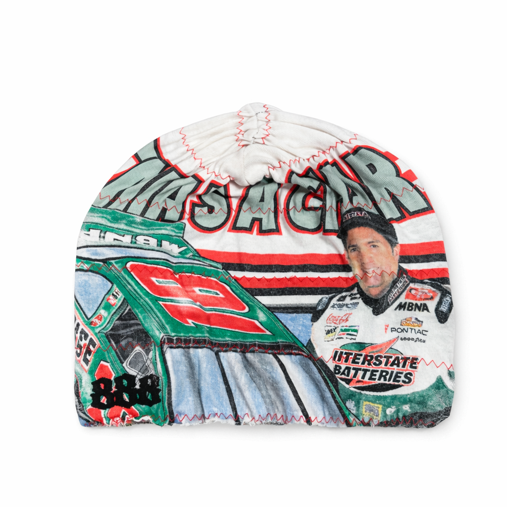 Colorful beanie with racing theme and visible branding on a white background