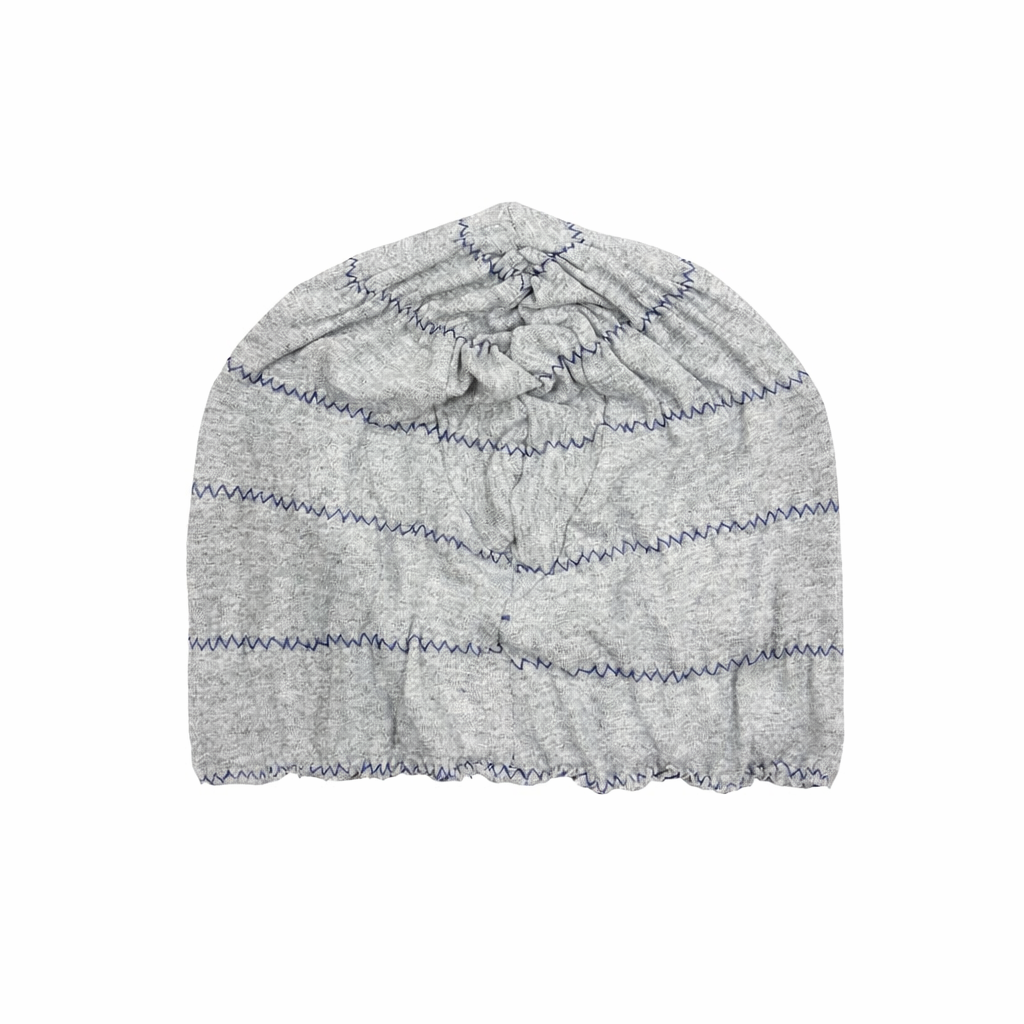 Gray knit beanie with blue accents on a white background
