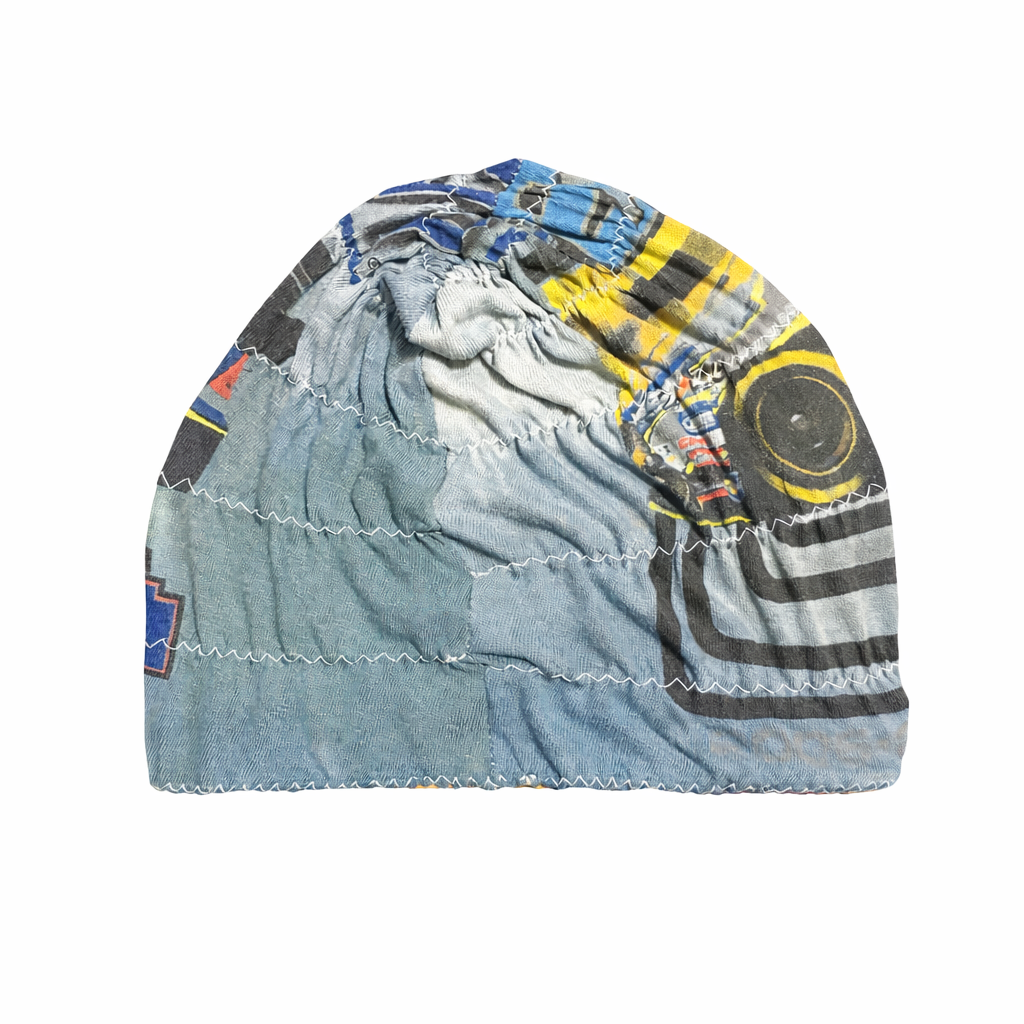 Multicolored beanie with patchwork design on a white background
