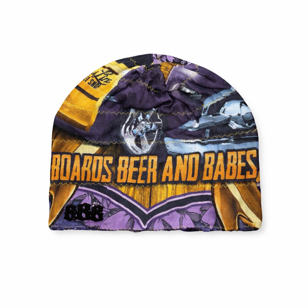 Colorful beanie with text and graphics on a white background