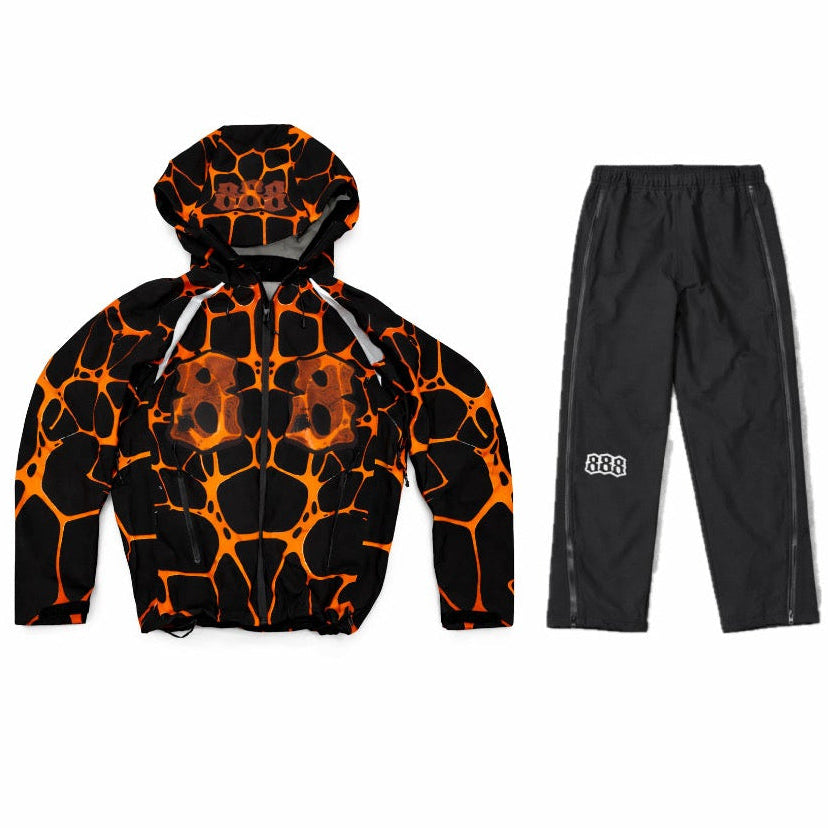 Orange and black patterned jacket with matching pants on a white background