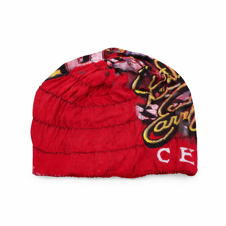 Red beanie with colorful patterns and branding on a white background