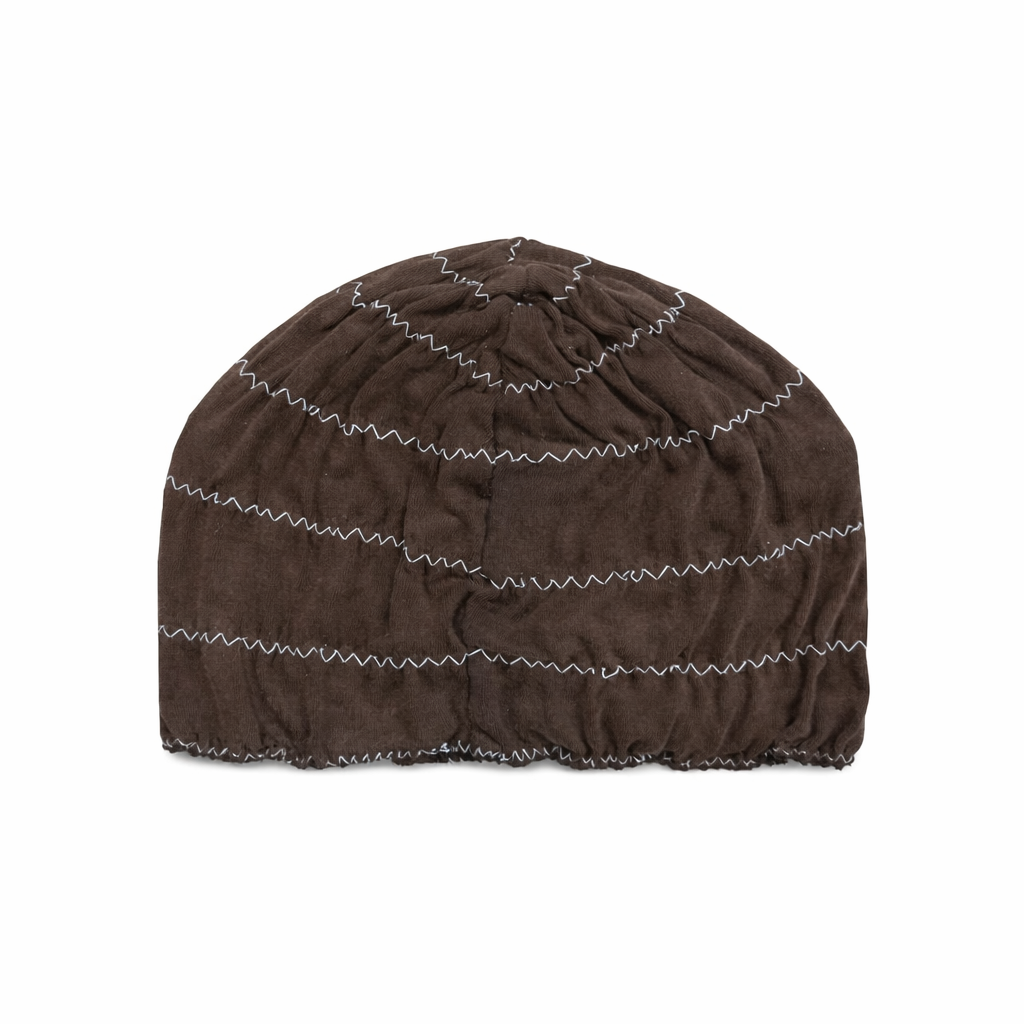 Brown beanie with white stitching on a white background