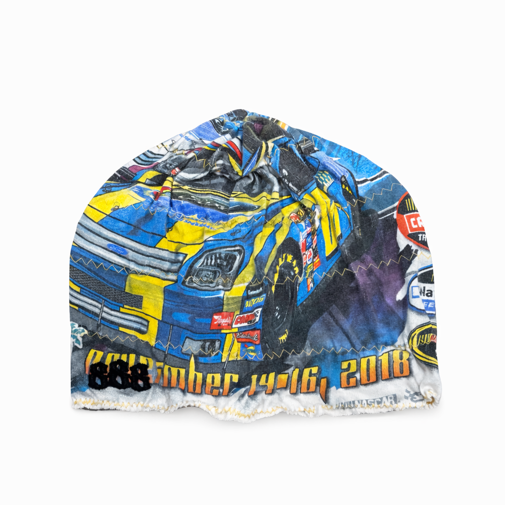 Beanie with a race car design on a white background