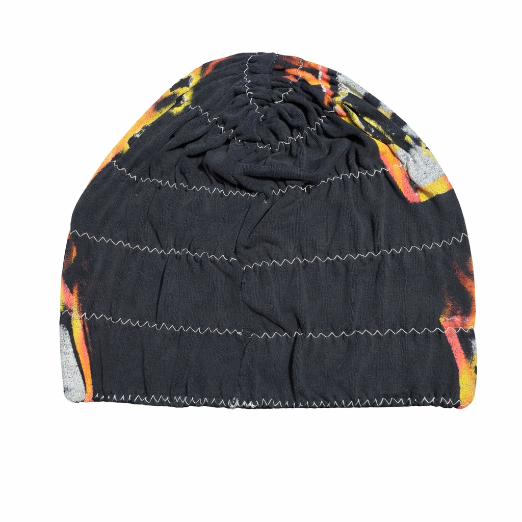 Black beanie with colorful patterns on a white background