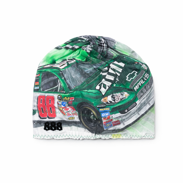 Green racing helmet with various sponsor logos on a white background