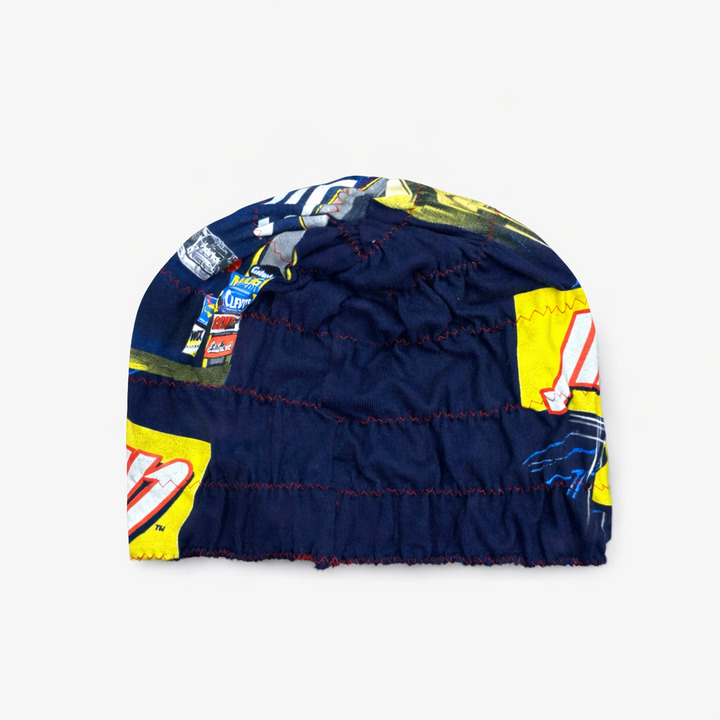 Navy blue beanie with colorful patterns on a white background
