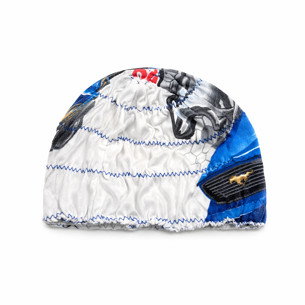 Colorful beanie with patterns and branding on a white background